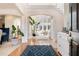 Two-story entryway with hardwood floors and view to living room at 179 Waterstone Pt, Acworth, GA 30101