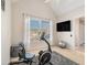 Bright home gym with recumbent bike and large window at 179 Waterstone Pt, Acworth, GA 30101