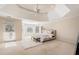 Spacious main bedroom with high ceilings, access to balcony, and ensuite bathroom at 179 Waterstone Pt, Acworth, GA 30101