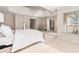 Luxurious main bedroom featuring high ceilings and ample natural light at 179 Waterstone Pt, Acworth, GA 30101