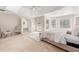Bright main bedroom with ensuite bathroom and access to private deck at 179 Waterstone Pt, Acworth, GA 30101