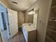 Bathroom with marble-top vanity and tile shower/tub at 3974 Stillwater Dr, Duluth, GA 30096