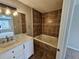 Bathroom with marble top vanity and jacuzzi tub at 3974 Stillwater Dr, Duluth, GA 30096