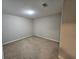 Empty carpeted bedroom with neutral walls at 3974 Stillwater Dr, Duluth, GA 30096