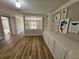 Hallway with built-in shelving and art at 3974 Stillwater Dr, Duluth, GA 30096