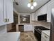 Renovated kitchen, white cabinets, quartz counters at 3974 Stillwater Dr, Duluth, GA 30096