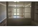 Bright living room with built-in shelving and hardwood floors at 3974 Stillwater Dr, Duluth, GA 30096
