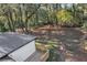 Expansive backyard view from the house with mature trees, deck, and natural setting at 2358 Tilson Rd, Decatur, GA 30032