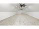 Bright bonus room featuring neutral carpeting and recessed lighting at 2731 Tribble Mill Rd, Lawrenceville, GA 30045