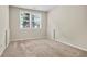 Carpeted room with natural lighting from windows and a neutral paint scheme at 3058 Turman Cir, Decatur, GA 30033