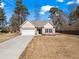 Charming single-Gathering home with a two-car garage and a well-manicured lawn in a quiet neighborhood at 45 3Rd E Ave, Dallas, GA 30157