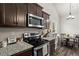 Kitchen view featuring stainless steel appliances and a breakfast nook at 45 3Rd E Ave, Dallas, GA 30157