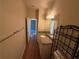 Bathroom featuring wood-look floors, granite counters, and single vanity at 7843 Nolan Trl, Snellville, GA 30039