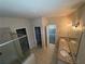 Bathroom featuring a glass shower, dual sinks, and a linen closet at 7843 Nolan Trl, Snellville, GA 30039