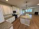 Kitchen features granite countertops, stainless steel appliances and large island at 7843 Nolan Trl, Snellville, GA 30039