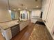Kitchen features granite countertops, stainless steel appliances and large island at 7843 Nolan Trl, Snellville, GA 30039