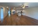 Open floor plan showcases kitchen with island and stainless steel appliances at 7843 Nolan Trl, Snellville, GA 30039