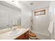 Clean bathroom with tub shower combo, vanity, and mirror at 796 Marion Beavers Rd, Sharpsburg, GA 30277