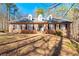 Brick house with a two-car garage and landscaped yard at 796 Marion Beavers Rd, Sharpsburg, GA 30277