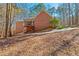 Brick house exterior with screened porch and stairs leading to backyard at 796 Marion Beavers Rd, Sharpsburg, GA 30277