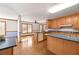 Eat-in kitchen with island, wood cabinets and sunny breakfast nook at 796 Marion Beavers Rd, Sharpsburg, GA 30277