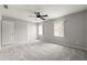Bright bedroom with neutral walls, carpet flooring, and closet at 2777 Northwood Sw Ct, Marietta, GA 30060