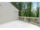 Outdoor deck with white railings and access door to the house at 2777 Northwood Sw Ct, Marietta, GA 30060