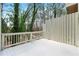 Outdoor deck area with wooden railings and surrounding greenery at 2777 Northwood Sw Ct, Marietta, GA 30060