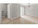Well-lit dining area with sliding glass doors and laundry room access at 2777 Northwood Sw Ct, Marietta, GA 30060