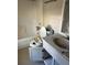 Bathroom featuring a bathtub, toilet and a vanity at 683 Wood Path Ct, Stone Mountain, GA 30083