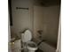 Functional bathroom with a toilet, sink, and shower with tub at 683 Wood Path Ct, Stone Mountain, GA 30083