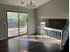 Bright dining room with hardwood floors and sliding glass doors to a patio or deck at 683 Wood Path Ct, Stone Mountain, GA 30083