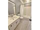 Bathroom featuring vanity with sink and shower-tub combo at 738 Brentwood Pl, Marietta, GA 30067