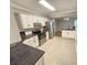 Kitchen featuring stainless steel appliances, granite countertops, and ample cabinet space at 738 Brentwood Pl, Marietta, GA 30067