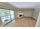 Inviting living room featuring a fireplace and sliding glass door to a balcony at 738 Brentwood Pl, Marietta, GA 30067