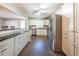 Modern kitchen with stainless steel appliances and white cabinets at 1171 Larch Ln, Decatur, GA 30033