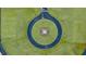 Aerial view of a well-designed neighborhood entrance with circular landscaping at 353 Sound Cir, Stockbridge, GA 30281