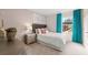 Well-lit bedroom with a double bed, complemented by stylish curtains and tasteful decor, creating a cozy retreat at 353 Sound Cir, Stockbridge, GA 30281