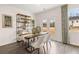 Bright dining room featuring modern decor, ample natural light, and a door leading to the backyard at 353 Sound Cir, Stockbridge, GA 30281