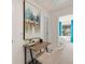 Bright hallway with desk space and views into bedrooms offering an inviting and functional transition between spaces at 353 Sound Cir, Stockbridge, GA 30281