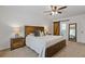 Main bedroom with a barn door to the bathroom and plenty of natural light at 280 Sea Holly Cir, Roswell, GA 30076