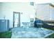 Outdoor patio with table and chairs, perfect for relaxing and enjoying the fresh air at 264 Magnaview Dr, Mcdonough, GA 30253