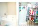 Bathroom featuring a tub, shower, and storage racks at 264 Magnaview Dr, Mcdonough, GA 30253