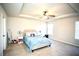 Spacious bedroom features a tray ceiling, ceiling fan, and carpeted floor at 264 Magnaview Dr, Mcdonough, GA 30253