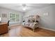 Bedroom with hardwood floors, a window and a bunk bed at 2779 Horseshoe Knoll Ln, Roswell, GA 30075