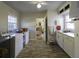 Laundry room with washer, dryer, and built-in cabinets at 5154 Central Dr, Stone Mountain, GA 30083
