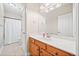 Clean bathroom with wood cabinets, a shower, and a bathtub at 131 Gold Springs Ct, Canton, GA 30114