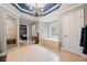 Elegant bathroom with soaking tub, walk-in shower, and chandelier at 131 Gold Springs Ct, Canton, GA 30114