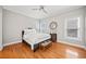 Bright bedroom with hardwood floors and ceiling fan at 131 Gold Springs Ct, Canton, GA 30114