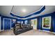 Basement home theater with multiple recliner seats and projector at 131 Gold Springs Ct, Canton, GA 30114